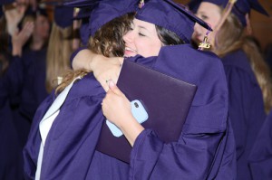 Two LSU Art and Design students embrace at graduation