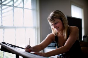 A female student draws on a board
